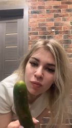 Licking a poo78657657567567ped cucumber 00001