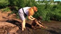 Kat smeared and bathes in cow shit 00003