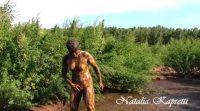 Kat smeared and bathes in cow shit 00005